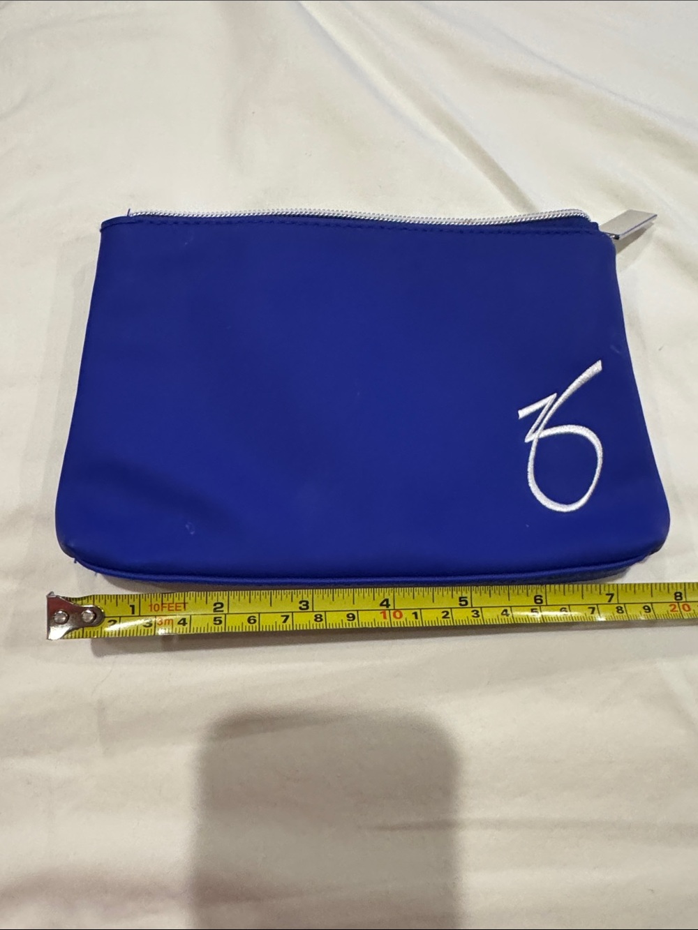 Blue Mini Pouch with White Script Logo - Compact Everyday Bag